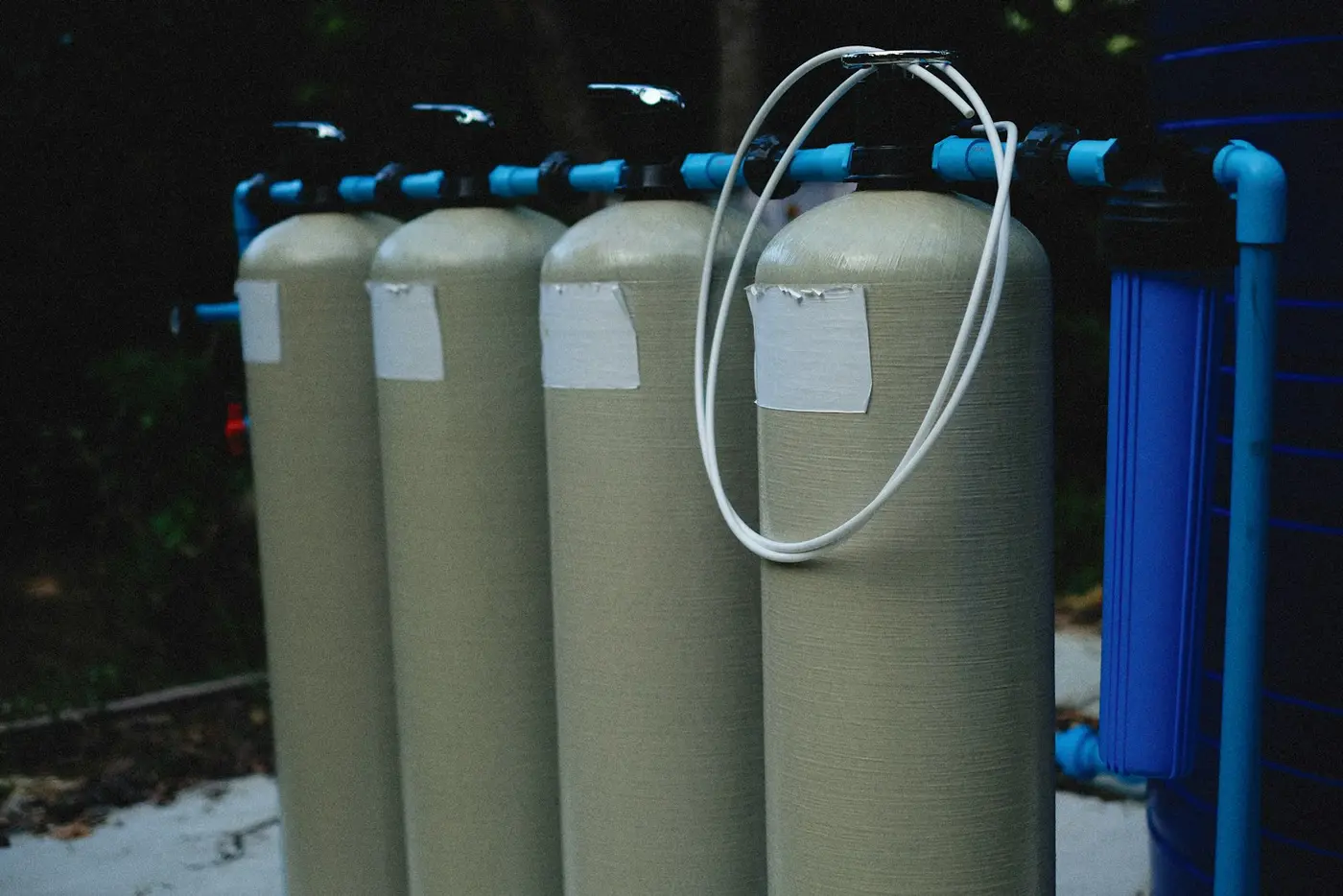 A row of water filtration units installed in line